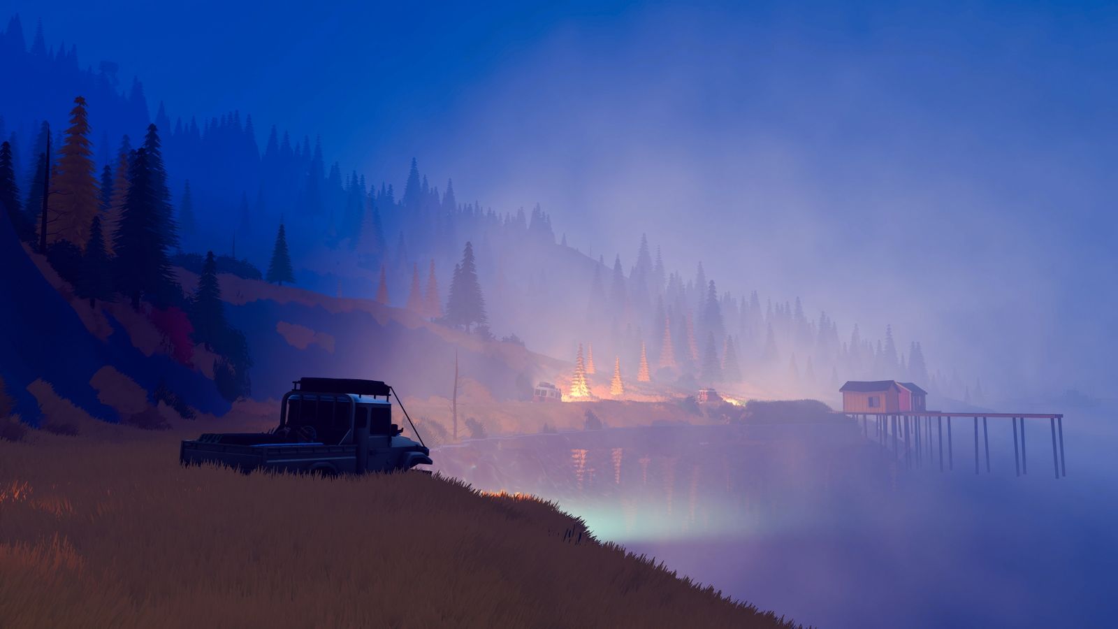 Classic 4x4s crossing a misty lakeside trail in over the hill